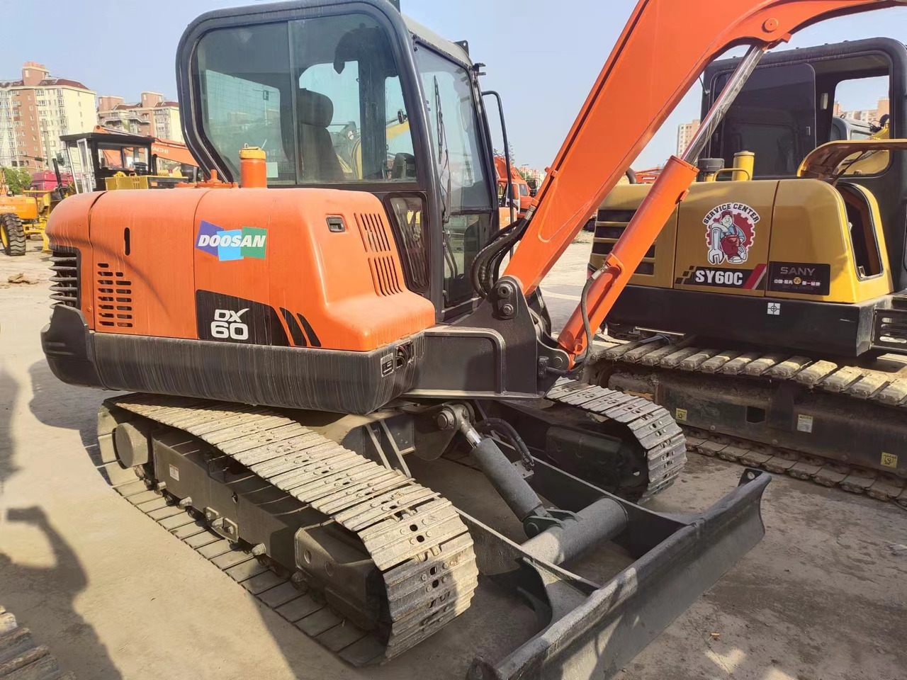 DOOSAN DX60 - Ekskavator mini: gambar 1 DOOSAN DX60 - Ekskavator mini: gambar 1