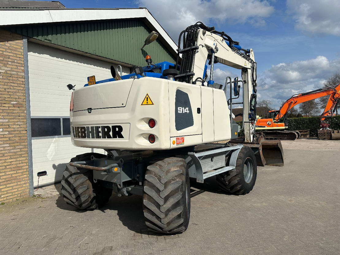 Liebherr A914  - Ekskavator roda: gambar 4 Liebherr A914  - Ekskavator roda: gambar 4