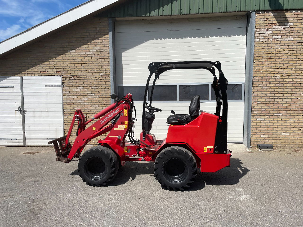 Schäffer 2033 - Wheel loader: gambar 1 Schäffer 2033 - Wheel loader: gambar 1