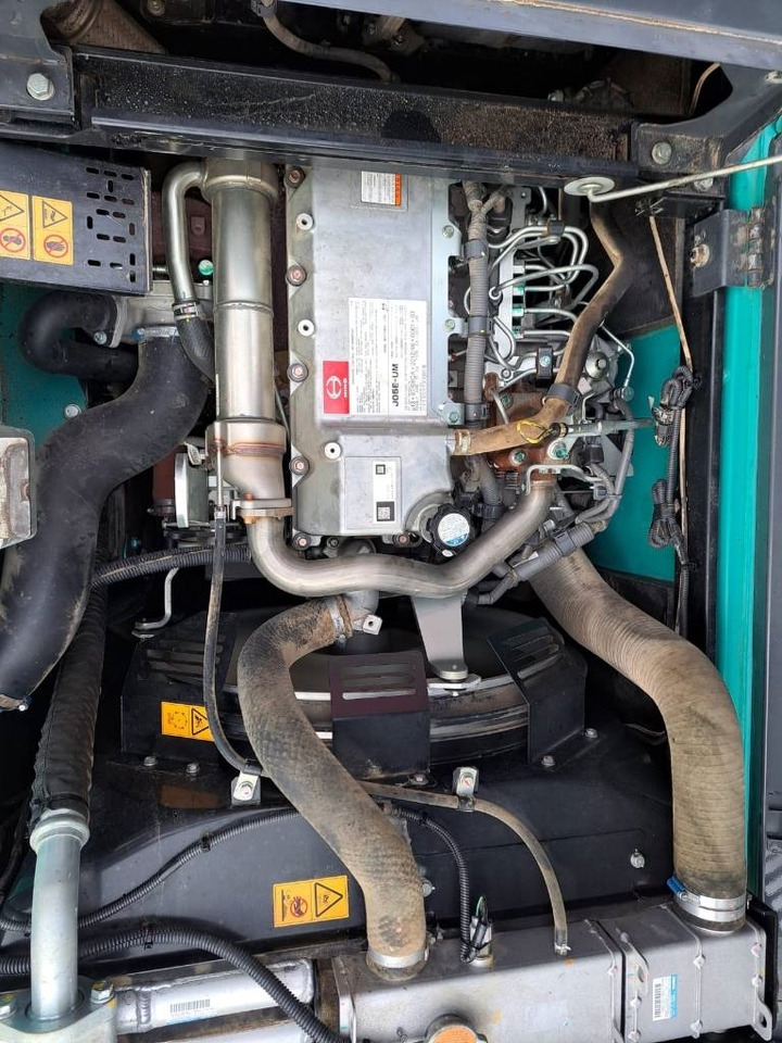 Ekskavator perayap Kobelco SK 210-10: gambar 12