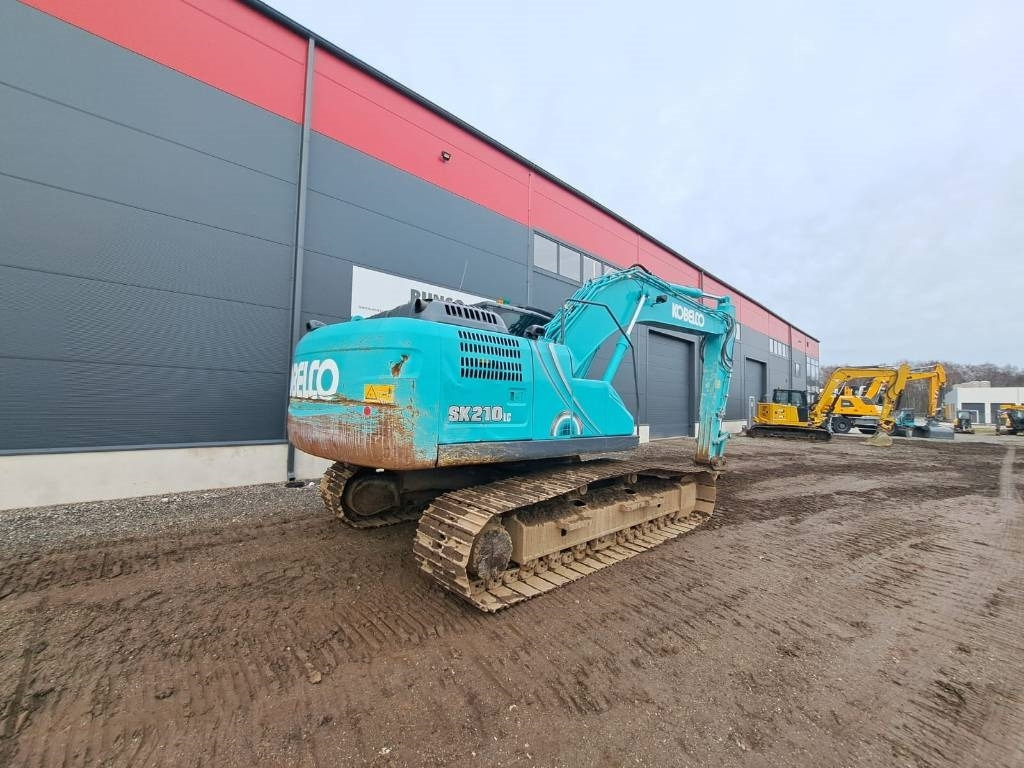 Ekskavator perayap Kobelco SK 210-10: gambar 6