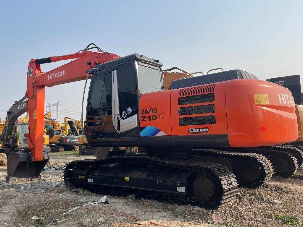 Hitachi ZX 210 - Ekskavator perayap: gambar 1 Hitachi ZX 210 - Ekskavator perayap: gambar 1