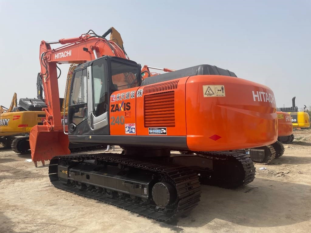 Hitachi ZX240 - Ekskavator perayap: gambar 1 Hitachi ZX240 - Ekskavator perayap: gambar 1