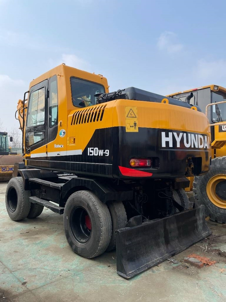 Hyundai R150W - Ekskavator roda: gambar 2 Hyundai R150W - Ekskavator roda: gambar 2