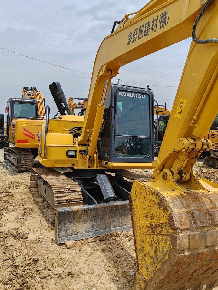 Komatsu PC 100 - Ekskavator perayap: gambar 5 Komatsu PC 100 - Ekskavator perayap: gambar 5
