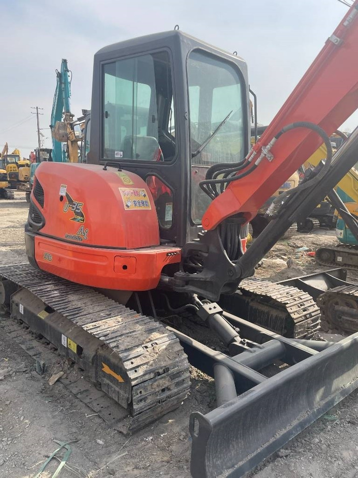 Kubota U35 - Ekskavator mini: gambar 2 Kubota U35 - Ekskavator mini: gambar 2