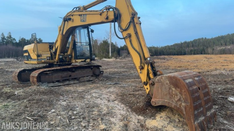 1994 Cat 312 gravemaskin med tannskuffe og pusseskuffe - Ekskavator: gambar 1 1994 Cat 312 gravemaskin med tannskuffe og pusseskuffe - Ekskavator: gambar 1
