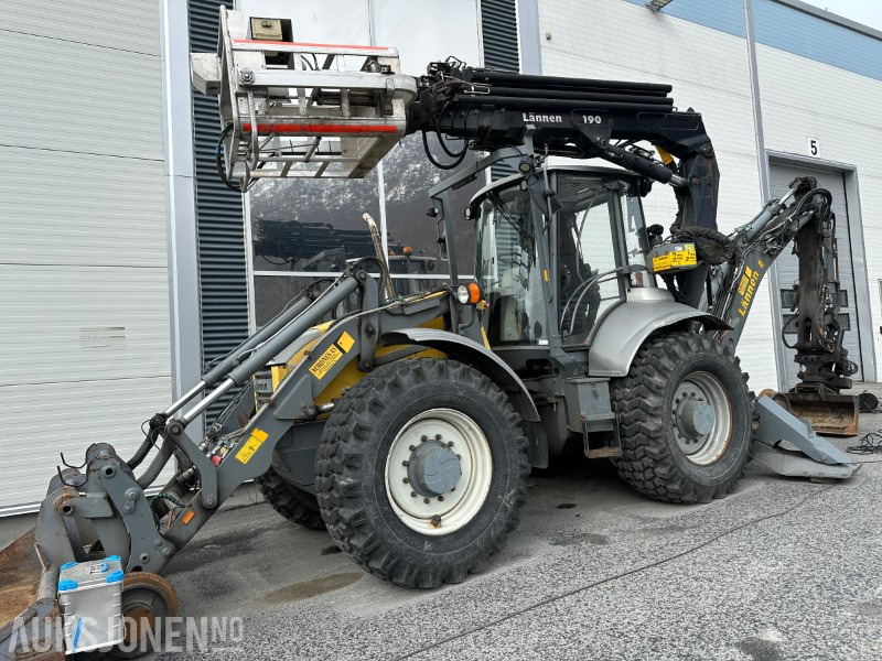 2007 8600E LÄNNEN SKINNE/VEI GRAVELASTER M/PERSONLIFT, RAMMESTYRT - JERNBANE MASKIN - Backhoe loader: gambar 1 2007 8600E LÄNNEN SKINNE/VEI GRAVELASTER M/PERSONLIFT, RAMMESTYRT - JERNBANE MASKIN - Backhoe loader: gambar 1