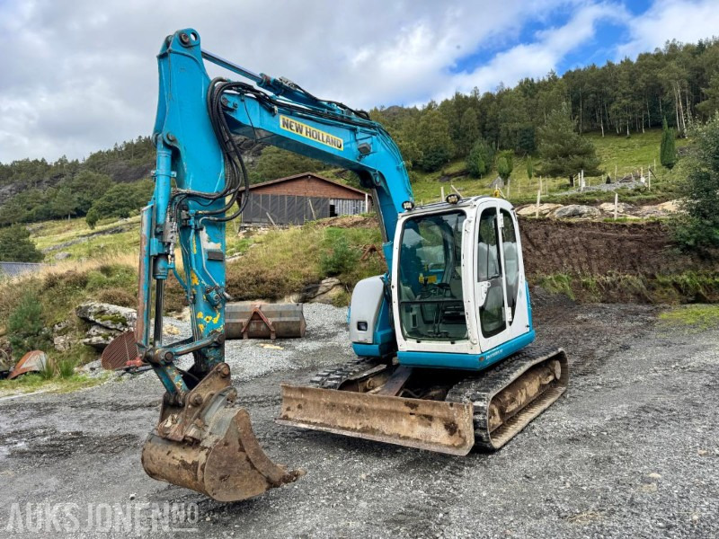 2008 New Holland E70SR-ES Gravemaskin - Tannskuffe - Grøfteskuffe - Pusseskuffe - Timer: 5746 - Ekskavator mini: gambar 1 2008 New Holland E70SR-ES Gravemaskin - Tannskuffe - Grøfteskuffe - Pusseskuffe - Timer: 5746 - Ekskavator mini: gambar 1