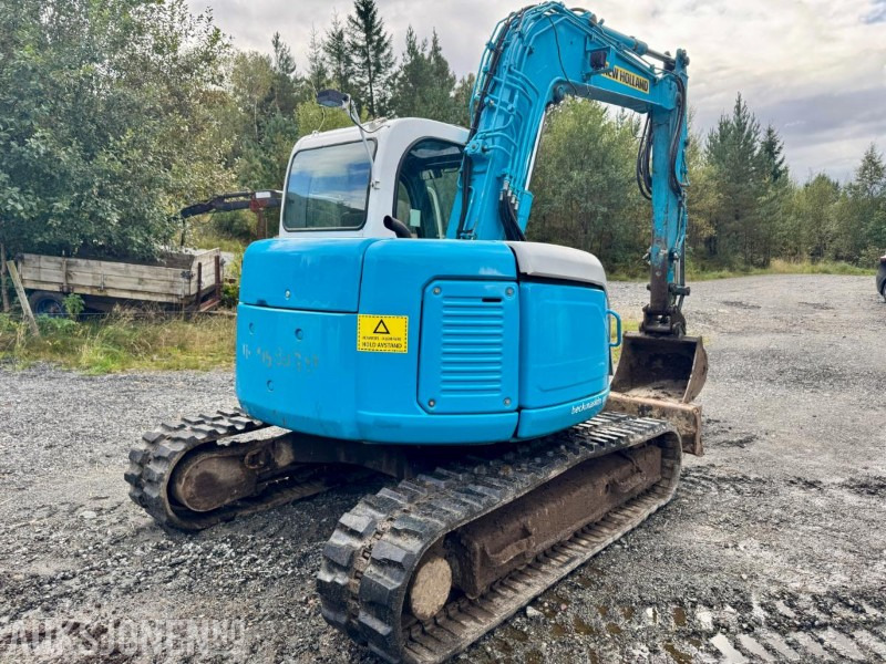 2008 New Holland E70SR-ES Gravemaskin - Tannskuffe - Grøfteskuffe - Pusseskuffe - Timer: 5746 - Ekskavator mini: gambar 4 2008 New Holland E70SR-ES Gravemaskin - Tannskuffe - Grøfteskuffe - Pusseskuffe - Timer: 5746 - Ekskavator mini: gambar 4