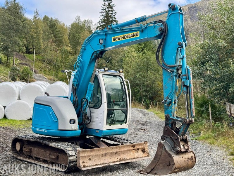 2008 New Holland E70SR-ES Gravemaskin - Tannskuffe - Grøfteskuffe - Pusseskuffe - Timer: 5746 - Ekskavator mini: gambar 2 2008 New Holland E70SR-ES Gravemaskin - Tannskuffe - Grøfteskuffe - Pusseskuffe - Timer: 5746 - Ekskavator mini: gambar 2