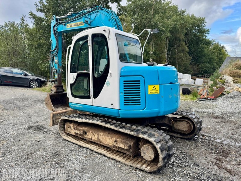 2008 New Holland E70SR-ES Gravemaskin - Tannskuffe - Grøfteskuffe - Pusseskuffe - Timer: 5746 - Ekskavator mini: gambar 3 2008 New Holland E70SR-ES Gravemaskin - Tannskuffe - Grøfteskuffe - Pusseskuffe - Timer: 5746 - Ekskavator mini: gambar 3