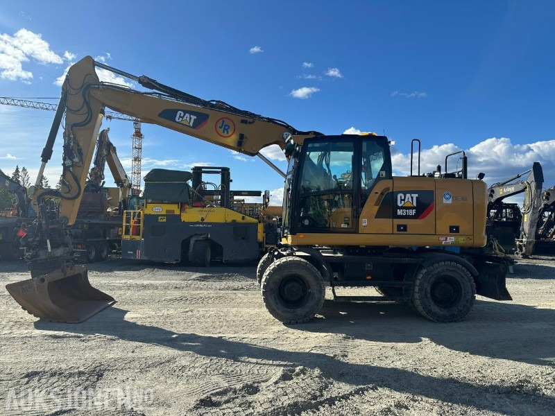 2019 Cat M318F hjulgraver med tiltrotator og skuff - Ekskavator: gambar 1 2019 Cat M318F hjulgraver med tiltrotator og skuff - Ekskavator: gambar 1