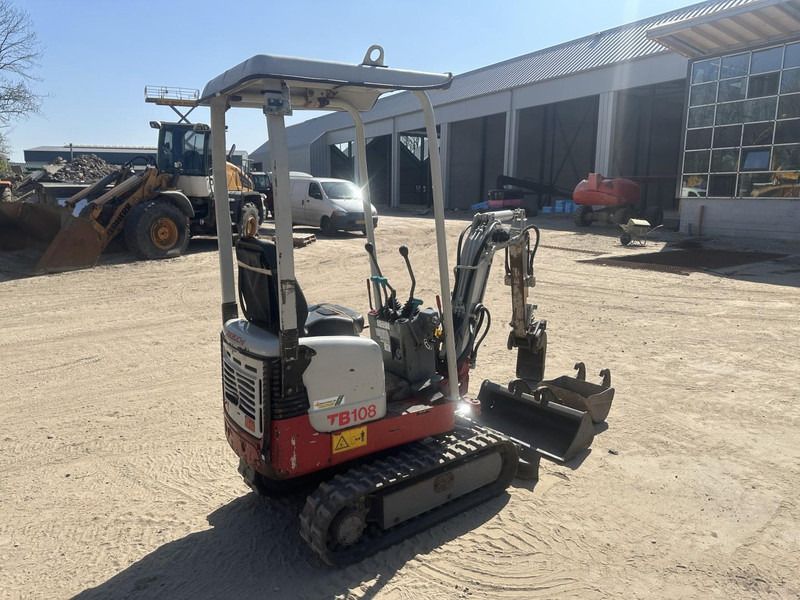 Takeuchi TB 108 3 buckets - Ekskavator mini: gambar 5 Takeuchi TB 108 3 buckets - Ekskavator mini: gambar 5