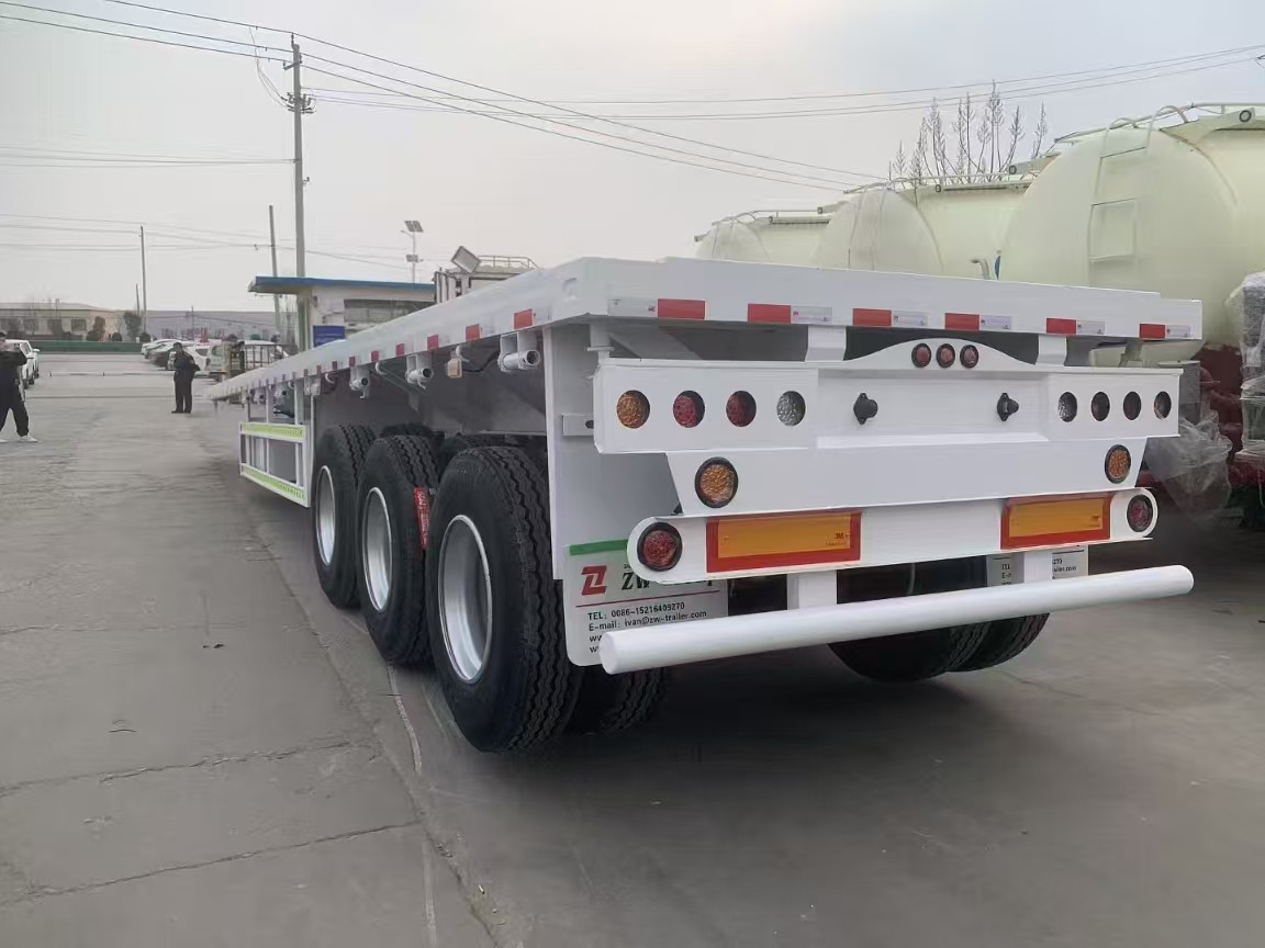 ZHICHENG Semi Flat Bed Low Bed Lowboy bed truck in New or Used Condition and various Size for Sale - Semi-trailer low bed: gambar 3 ZHICHENG Semi Flat Bed Low Bed Lowboy bed truck in New or Used Condition and various Size for Sale - Semi-trailer low bed: gambar 3