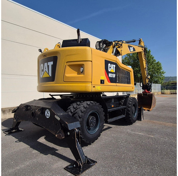 Caterpillar M315F - Ekskavator roda: gambar 5 Caterpillar M315F - Ekskavator roda: gambar 5