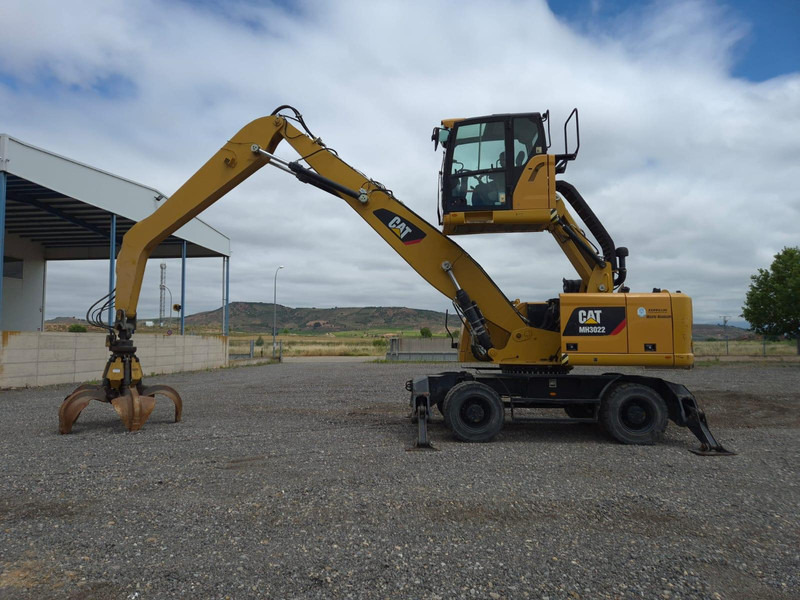 Caterpillar MH3022 - Ekskavator roda: gambar 1 Caterpillar MH3022 - Ekskavator roda: gambar 1