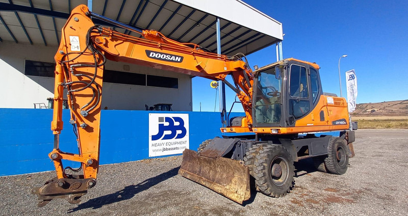 Doosan DX140W-3 - Ekskavator roda: gambar 5 Doosan DX140W-3 - Ekskavator roda: gambar 5