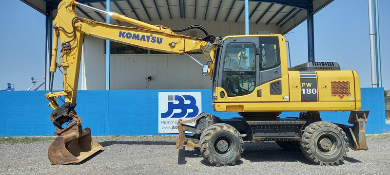 Komatsu PW180-7EO - Ekskavator roda: gambar 1 Komatsu PW180-7EO - Ekskavator roda: gambar 1
