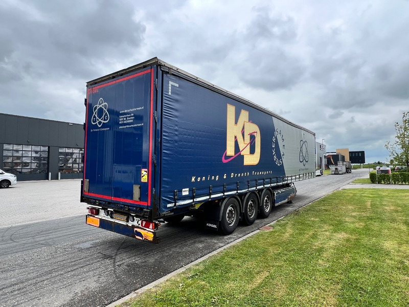 Kögel 3 assige schuizeilen oplegger S?24 / Lift Axle - Semi-trailer dengan terpal samping: gambar 4 Kögel 3 assige schuizeilen oplegger S?24 / Lift Axle - Semi-trailer dengan terpal samping: gambar 4