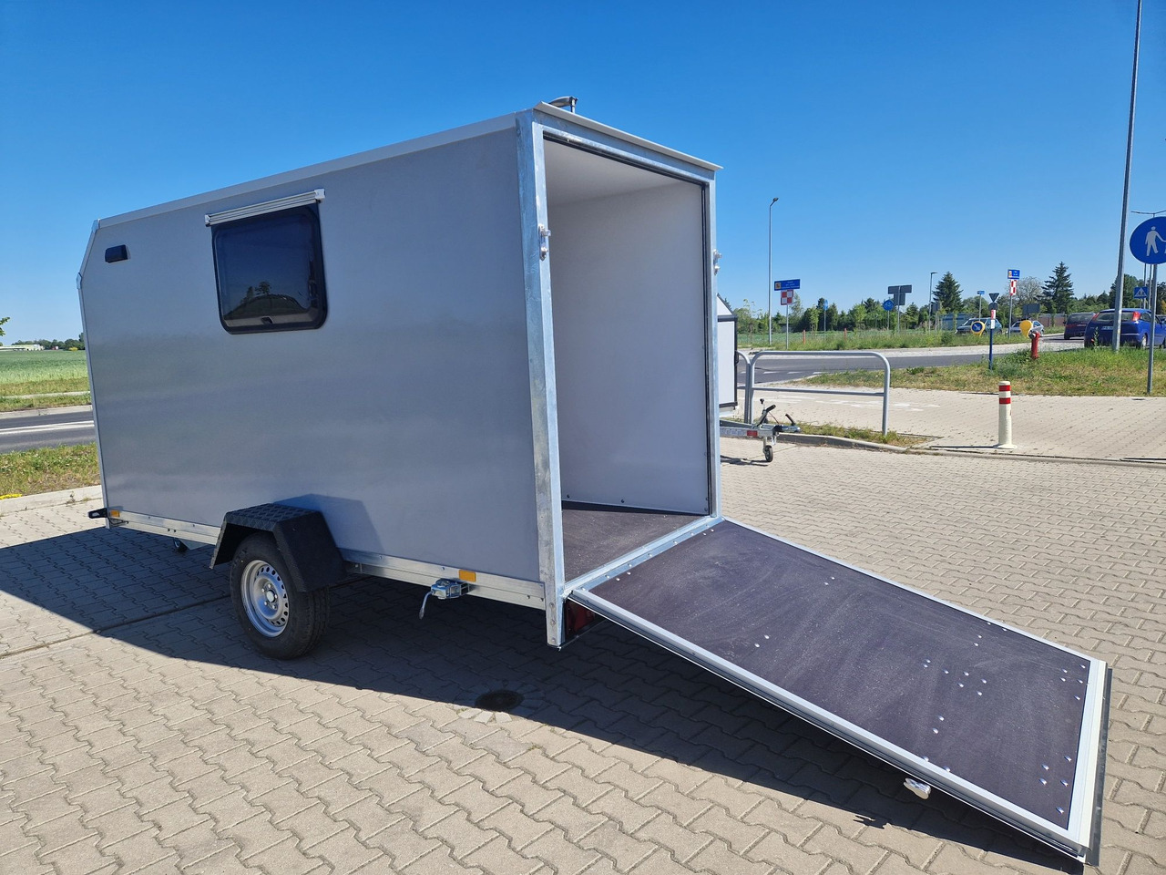 Przyczepa kempingowa Motocamp dla motocykla - Karavan: gambar 1 Przyczepa kempingowa Motocamp dla motocykla - Karavan: gambar 1