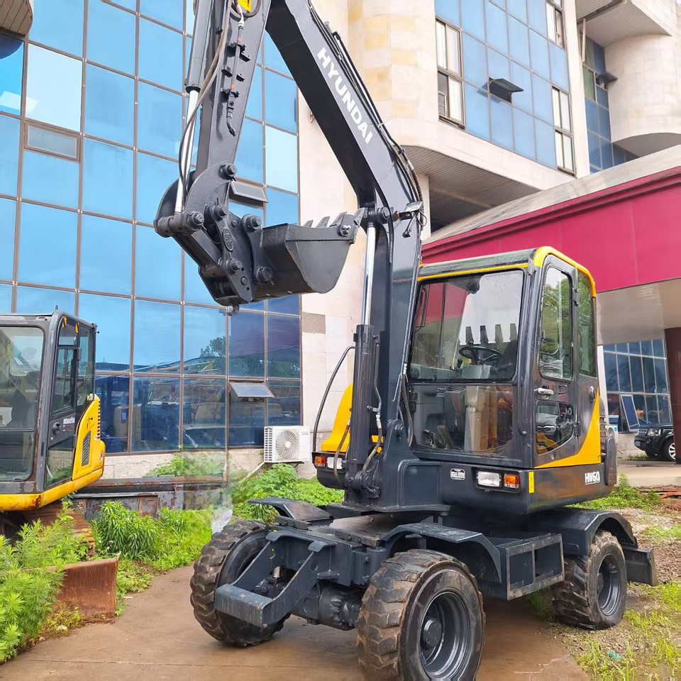 Hyundai HW60 excavator - Ekskavator roda: gambar 4 Hyundai HW60 excavator - Ekskavator roda: gambar 4