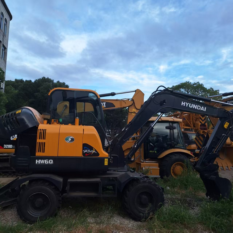 Hyundai HW60 excavator - Ekskavator roda: gambar 1 Hyundai HW60 excavator - Ekskavator roda: gambar 1