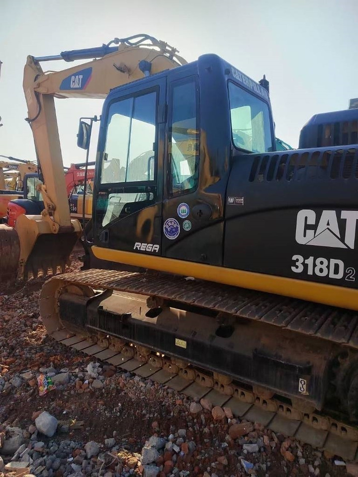 CAT 318 - Ekskavator perayap: gambar 1 CAT 318 - Ekskavator perayap: gambar 1