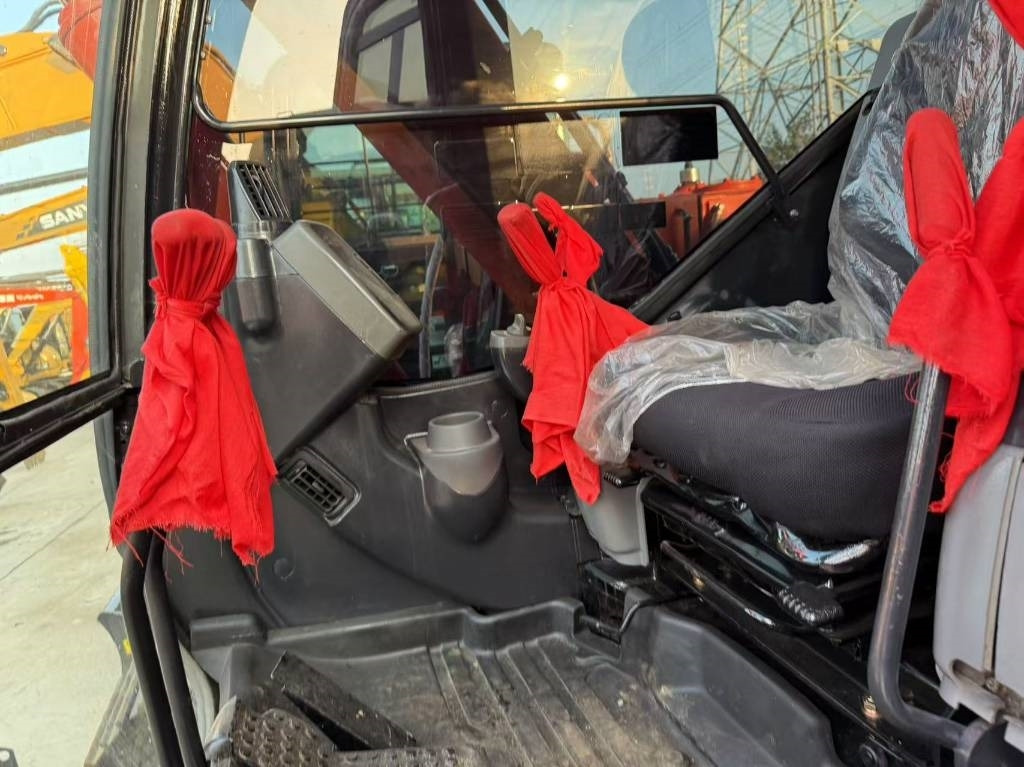 Hitachi 70 - Ekskavator perayap: gambar 3 Hitachi 70 - Ekskavator perayap: gambar 3