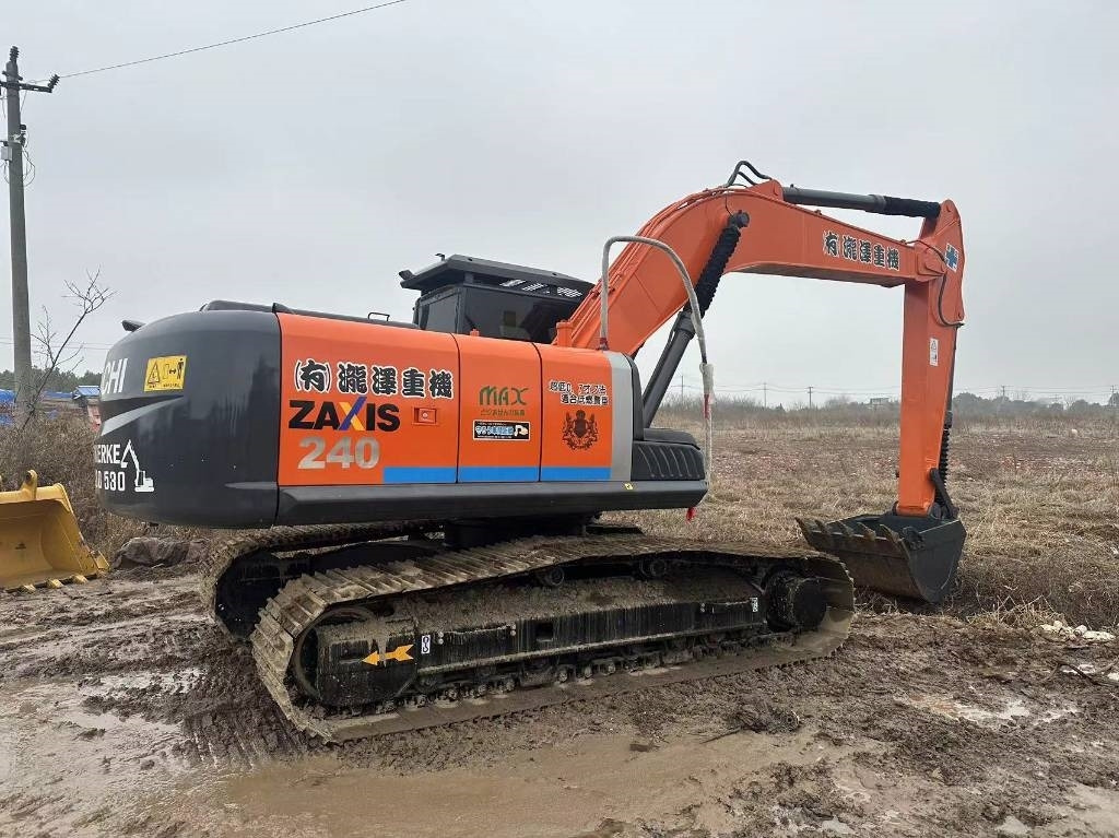 Hitachi ZX 240 - Ekskavator perayap: gambar 1 Hitachi ZX 240 - Ekskavator perayap: gambar 1