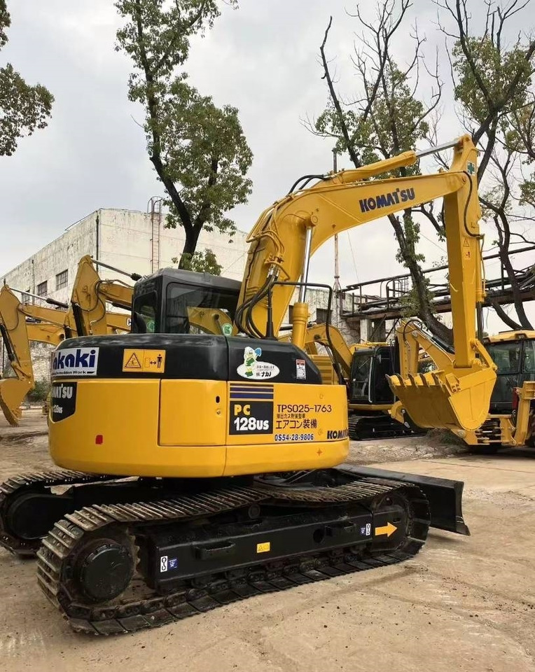 Ekskavator perayap Komatsu 128 US: gambar 14