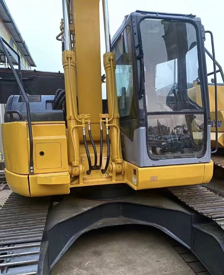 Ekskavator perayap Komatsu 128 US: gambar 9