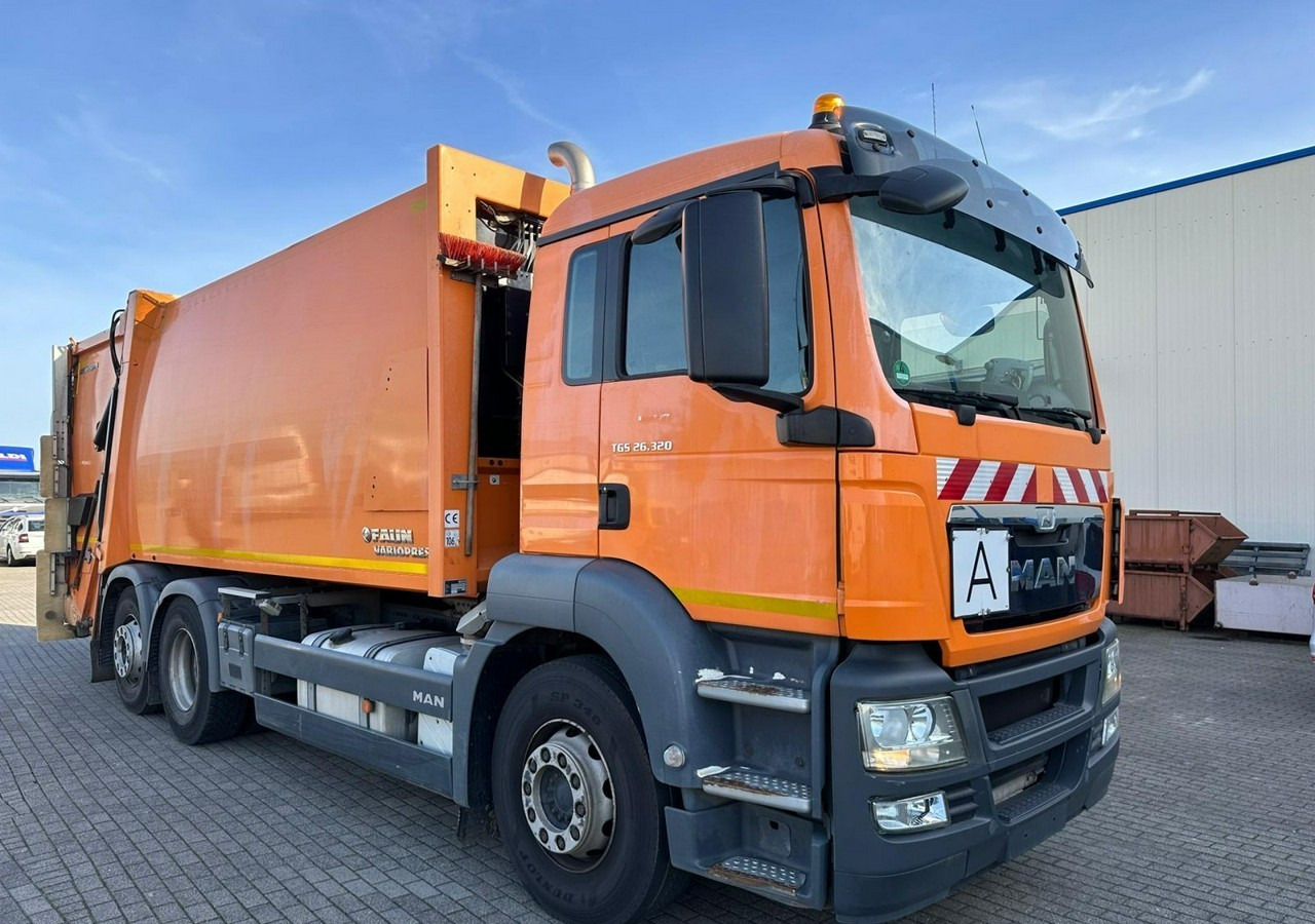 MAN Inny MAN TGS 26.320 FAUN VARIOPRESS Śmieciarka Prasa Model 2014 - Truk sampah: gambar 2 MAN Inny MAN TGS 26.320 FAUN VARIOPRESS Śmieciarka Prasa Model 2014 - Truk sampah: gambar 2