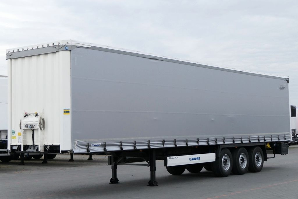 Krone CURTAINSIDER /STANDARD/LIFT ROOF & AXLE Krone CURTAINSIDER /STANDARD/LIFT ROOF & AXLE - Semi-trailer dengan terpal samping: gambar 1 Krone CURTAINSIDER /STANDARD/LIFT ROOF & AXLE Krone CURTAINSIDER /STANDARD/LIFT ROOF & AXLE - Semi-trailer dengan terpal samping: gambar 1