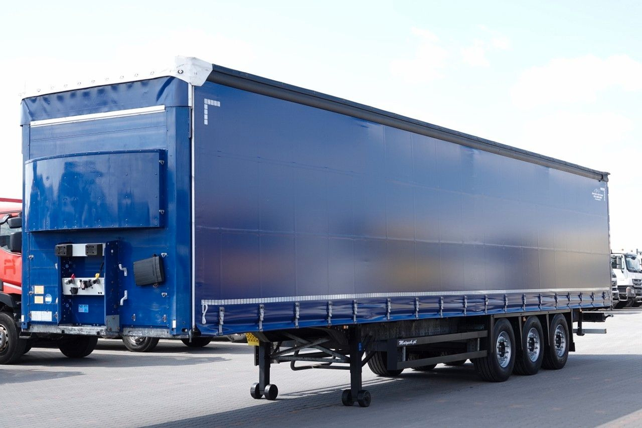 Schmitz Cargobull FIRANKA / STANDARD / OPONY 100% / MAŁO UŻYWANA - Semi-trailer dengan terpal samping: gambar 2 Schmitz Cargobull FIRANKA / STANDARD / OPONY 100% / MAŁO UŻYWANA - Semi-trailer dengan terpal samping: gambar 2