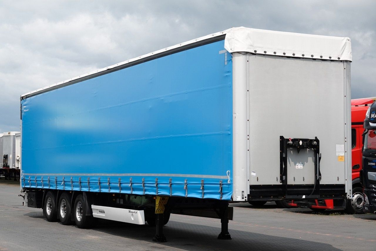Wielton FIRANKA MEGA / LOWDECK / OŚ PODNOSZONA / DACH PO Wielton FIRANKA MEGA / LOWDECK / OŚ PODNOSZONA / DACH PO - Semi-trailer dengan terpal samping: gambar 1 Wielton FIRANKA MEGA / LOWDECK / OŚ PODNOSZONA / DACH PO Wielton FIRANKA MEGA / LOWDECK / OŚ PODNOSZONA / DACH PO - Semi-trailer dengan terpal samping: gambar 1