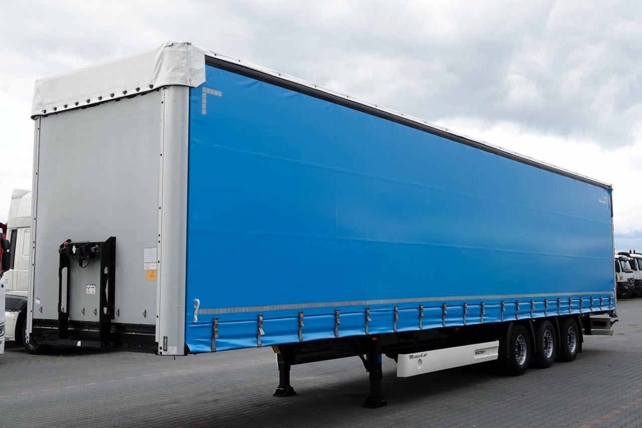 Wielton FIRANKA MEGA / LOWDECK / OŚ PODNOSZONA / DACH PO Wielton FIRANKA MEGA / LOWDECK / OŚ PODNOSZONA / DACH PO - Semi-trailer dengan terpal samping: gambar 2 Wielton FIRANKA MEGA / LOWDECK / OŚ PODNOSZONA / DACH PO Wielton FIRANKA MEGA / LOWDECK / OŚ PODNOSZONA / DACH PO - Semi-trailer dengan terpal samping: gambar 2
