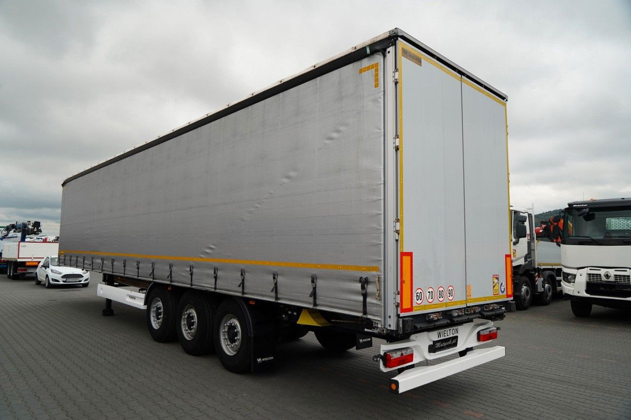 Wielton FIRANKA / STANDARD / OŚ PODNOSZONA / PLANDEKA Z - Semi-trailer dengan terpal samping: gambar 3 Wielton FIRANKA / STANDARD / OŚ PODNOSZONA / PLANDEKA Z - Semi-trailer dengan terpal samping: gambar 3