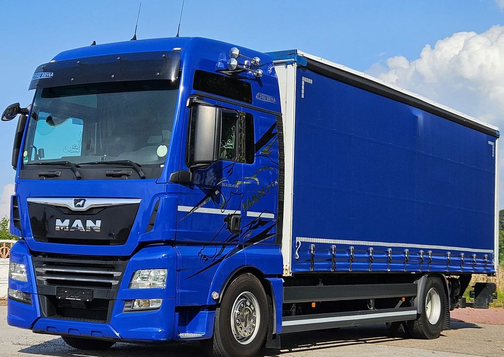 MAN TGX 18.430 / FIRANKA / WINDA / KLIMA POSTOJOWA / 300TYŚ PRZEBIEG / 2020 /E6 / KLIMA POSTOJOWA / SPROWADZONY / JAK NOWY / AUTOMAT - Truk dengan terpal samping: gambar 1 MAN TGX 18.430 / FIRANKA / WINDA / KLIMA POSTOJOWA / 300TYŚ PRZEBIEG / 2020 /E6 / KLIMA POSTOJOWA / SPROWADZONY / JAK NOWY / AUTOMAT - Truk dengan terpal samping: gambar 1