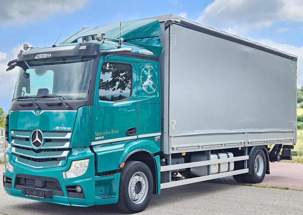 Mercedes-Benz ACTROS 1833 / BURTO-FIRANKA / WINDA / 18 PALET / 8600 ŁADOWNOŚĆ / AUTOMAT / DUŻY SILNIK / 10.2019 ROK / SYPIALKA / LEDY / KAMERY / VIRTUAL COCPIT/ JAK NOWY - Truk dengan terpal samping: gambar 1 Mercedes-Benz ACTROS 1833 / BURTO-FIRANKA / WINDA / 18 PALET / 8600 ŁADOWNOŚĆ / AUTOMAT / DUŻY SILNIK / 10.2019 ROK / SYPIALKA / LEDY / KAMERY / VIRTUAL COCPIT/ JAK NOWY - Truk dengan terpal samping: gambar 1