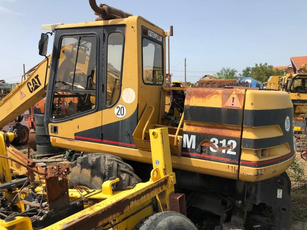 CAT M 312 FOR PARTS - Ekskavator roda: gambar 1 CAT M 312 FOR PARTS - Ekskavator roda: gambar 1