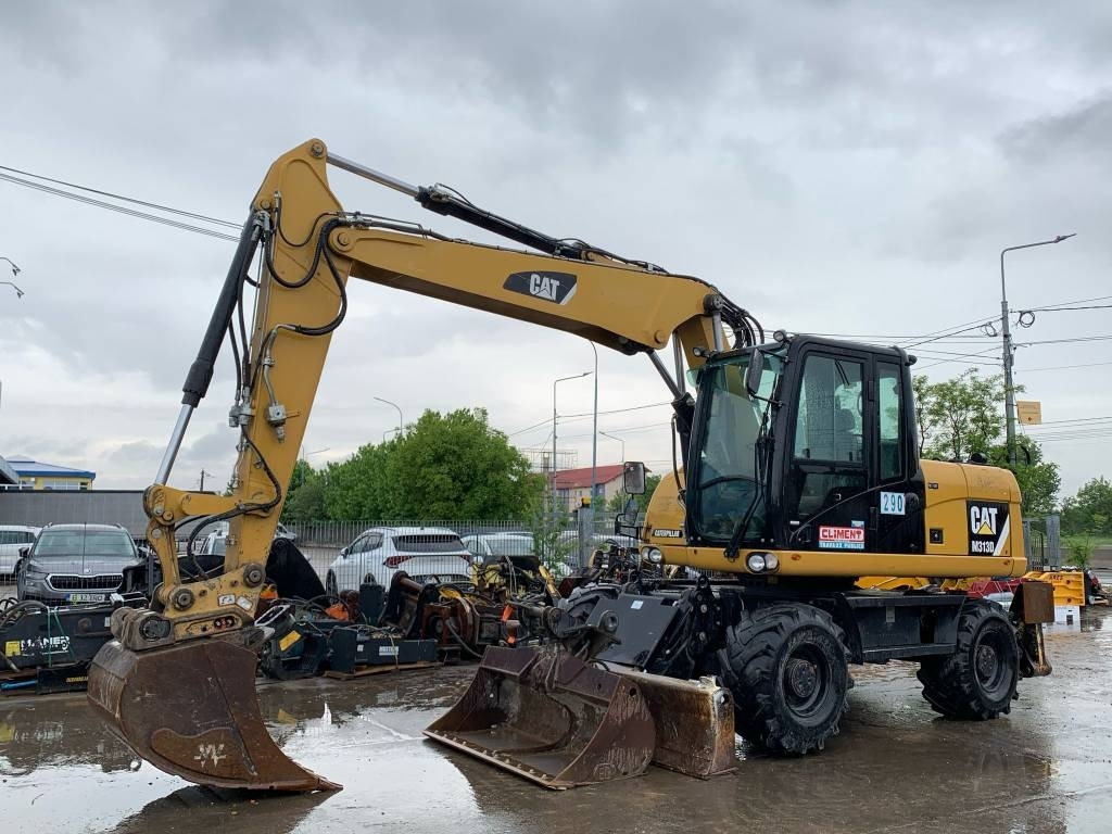 CAT M 313 D - Ekskavator roda: gambar 1 CAT M 313 D - Ekskavator roda: gambar 1