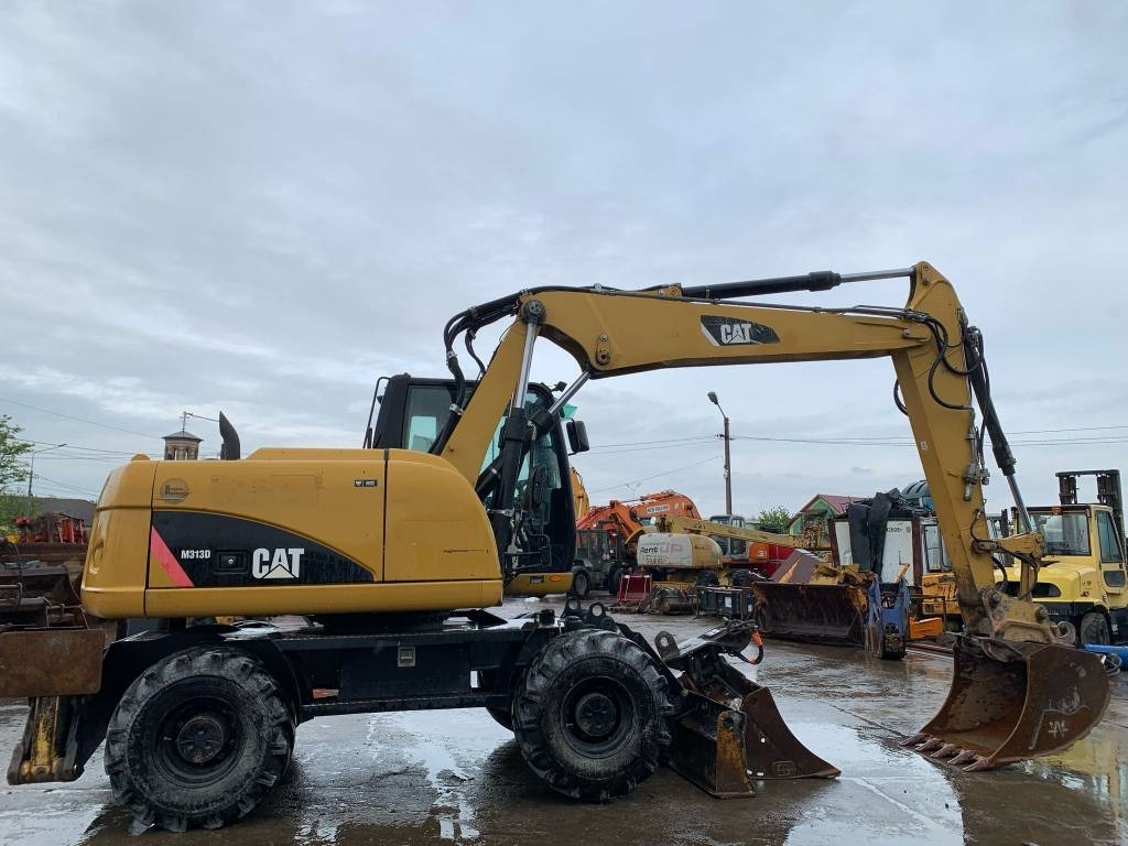 CAT M 313 D - Ekskavator roda: gambar 5 CAT M 313 D - Ekskavator roda: gambar 5