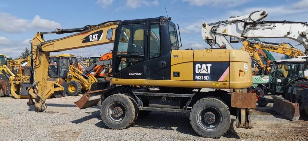 CAT M 315 D - Ekskavator roda: gambar 4 CAT M 315 D - Ekskavator roda: gambar 4
