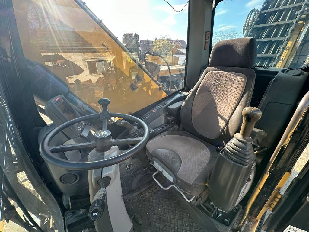 Mesin pengisi CAT M 318 D MH: gambar 10 Mesin pengisi CAT M 318 D MH: gambar 10