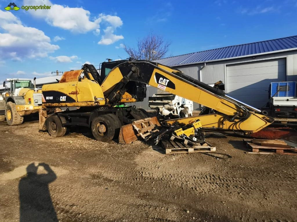 CAT M 318 D - Mesin pengisi: gambar 1 CAT M 318 D - Mesin pengisi: gambar 1