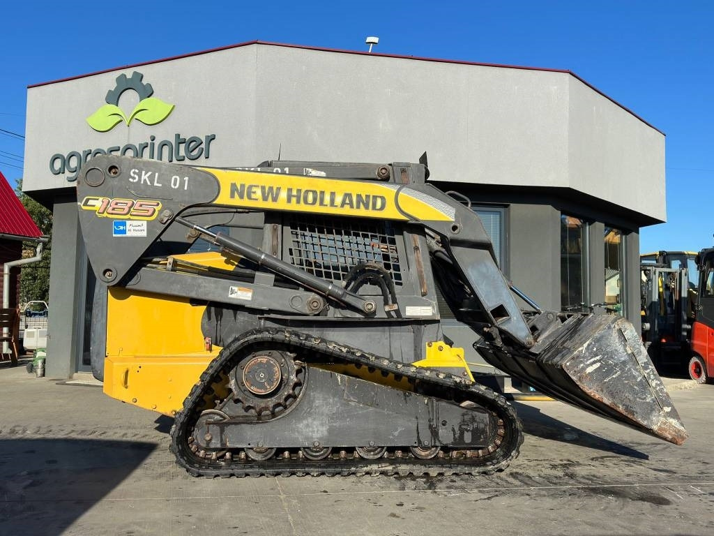 New Holland C 185 - Track loader yang ringkas: gambar 5 New Holland C 185 - Track loader yang ringkas: gambar 5