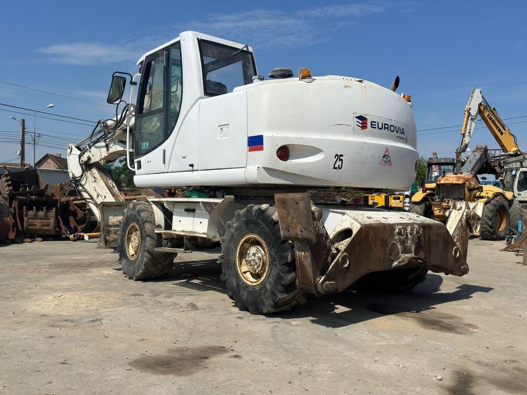 New Holland MH Plus - Ekskavator roda: gambar 5 New Holland MH Plus - Ekskavator roda: gambar 5