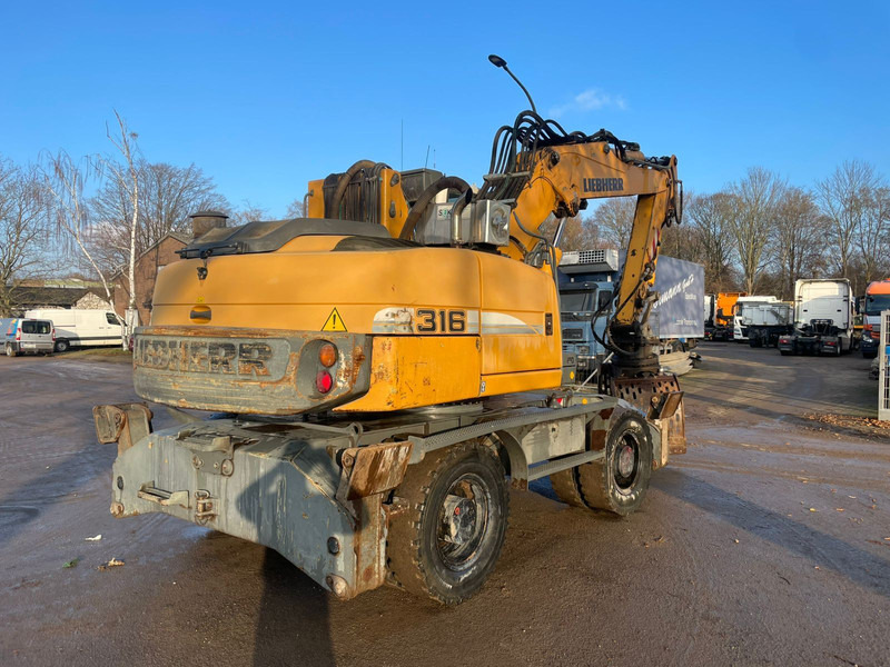 Liebherr A 316 - Ekskavator roda: gambar 3 Liebherr A 316 - Ekskavator roda: gambar 3