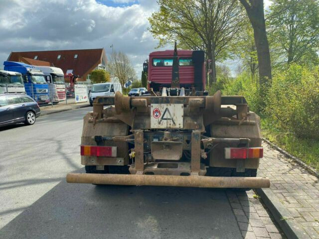 MAN 26.372K 6x4 Abrollkipper AHK Blatt/Blatt - Hook lift: gambar 3 MAN 26.372K 6x4 Abrollkipper AHK Blatt/Blatt - Hook lift: gambar 3